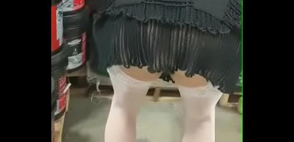  Wife up skirt at lows using her phone.